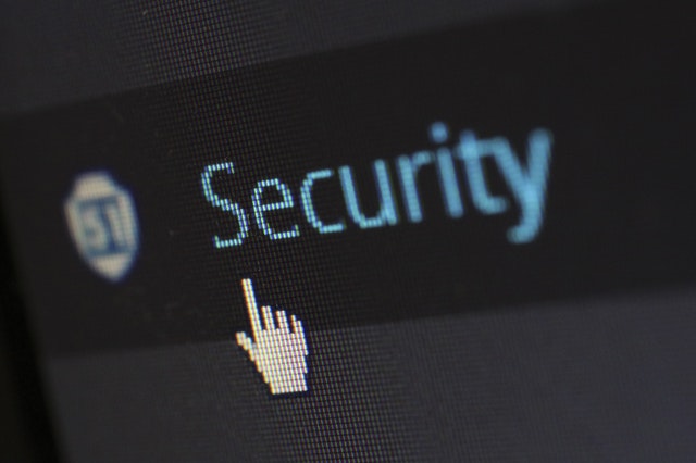 A close-up of a screen with the cursor over the word Security. 